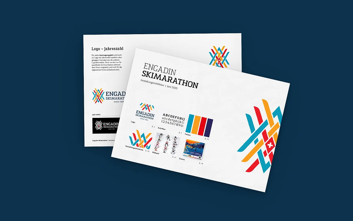 Titelseite und Logoseite der ESM-Gestaltungsrichtlinien angeschrägt auf dunkelblauer Fläche