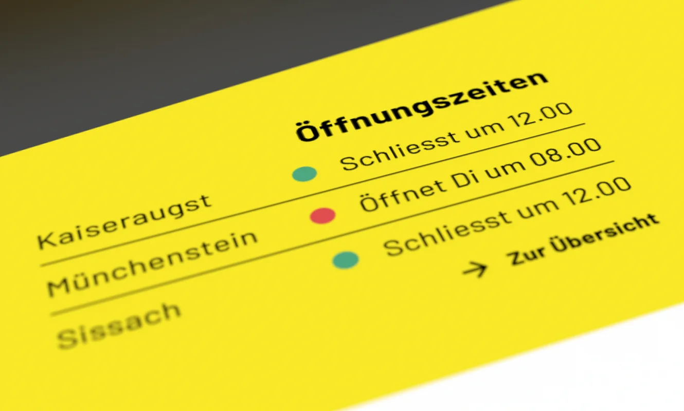 Angeschrägte Ansicht des Öffnungszeiten-Elements für Kaiseraugst, Münchenstein und Sissach mit Ampelpunkten